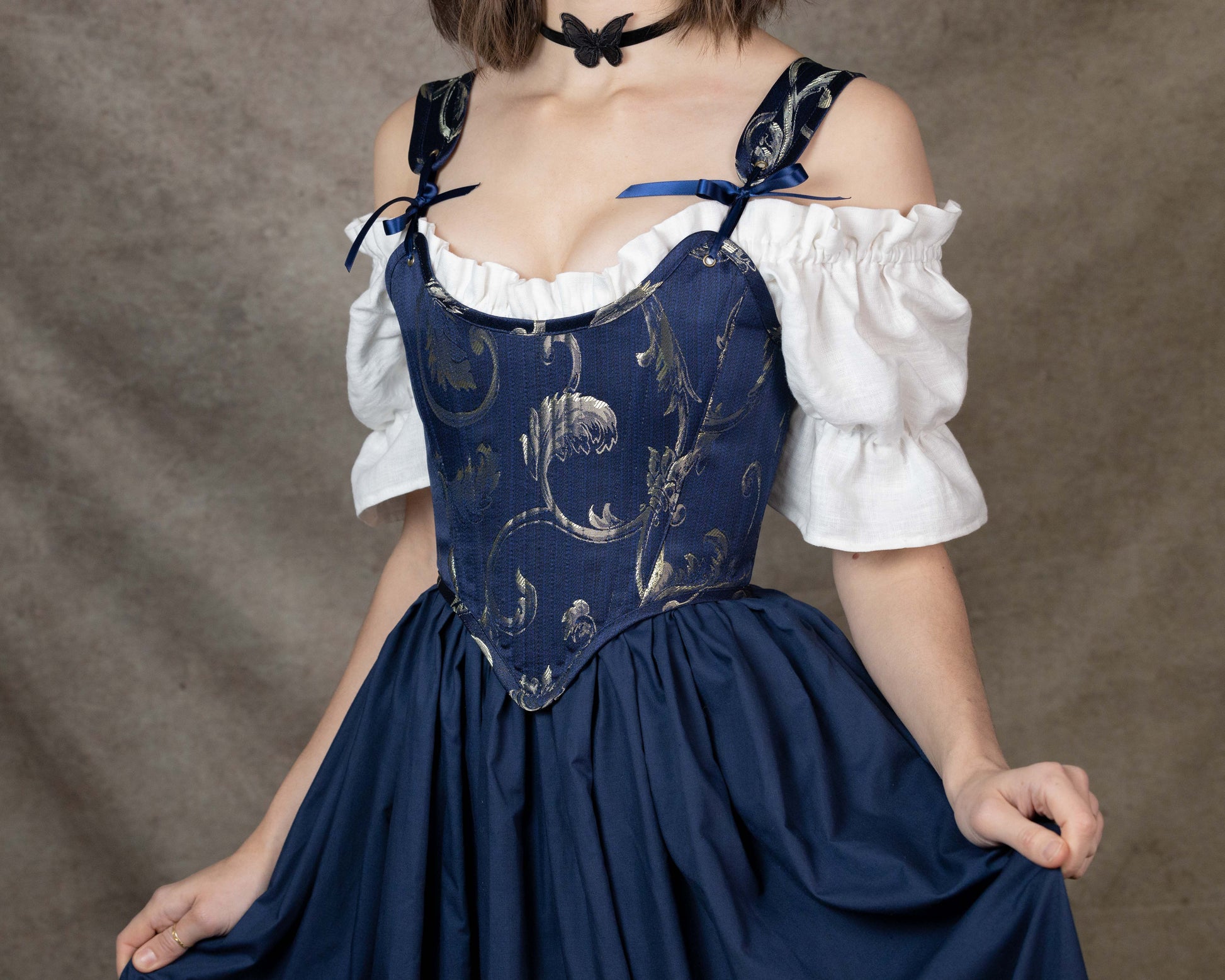 Handmade Blue and Gold Jacquard Stays with floral bodice, adjustable straps, and navy skirt in princess and knight aesthetic