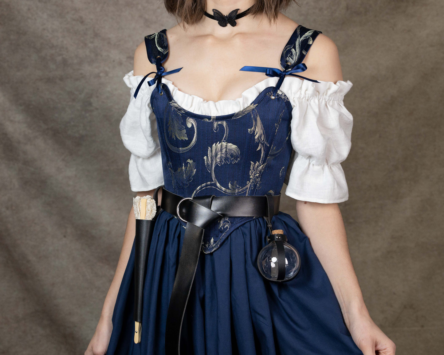 Handmade Blue and Gold Jacquard Stays with ornate bodice, adjustable straps, paired with white blouse and black belt accessory