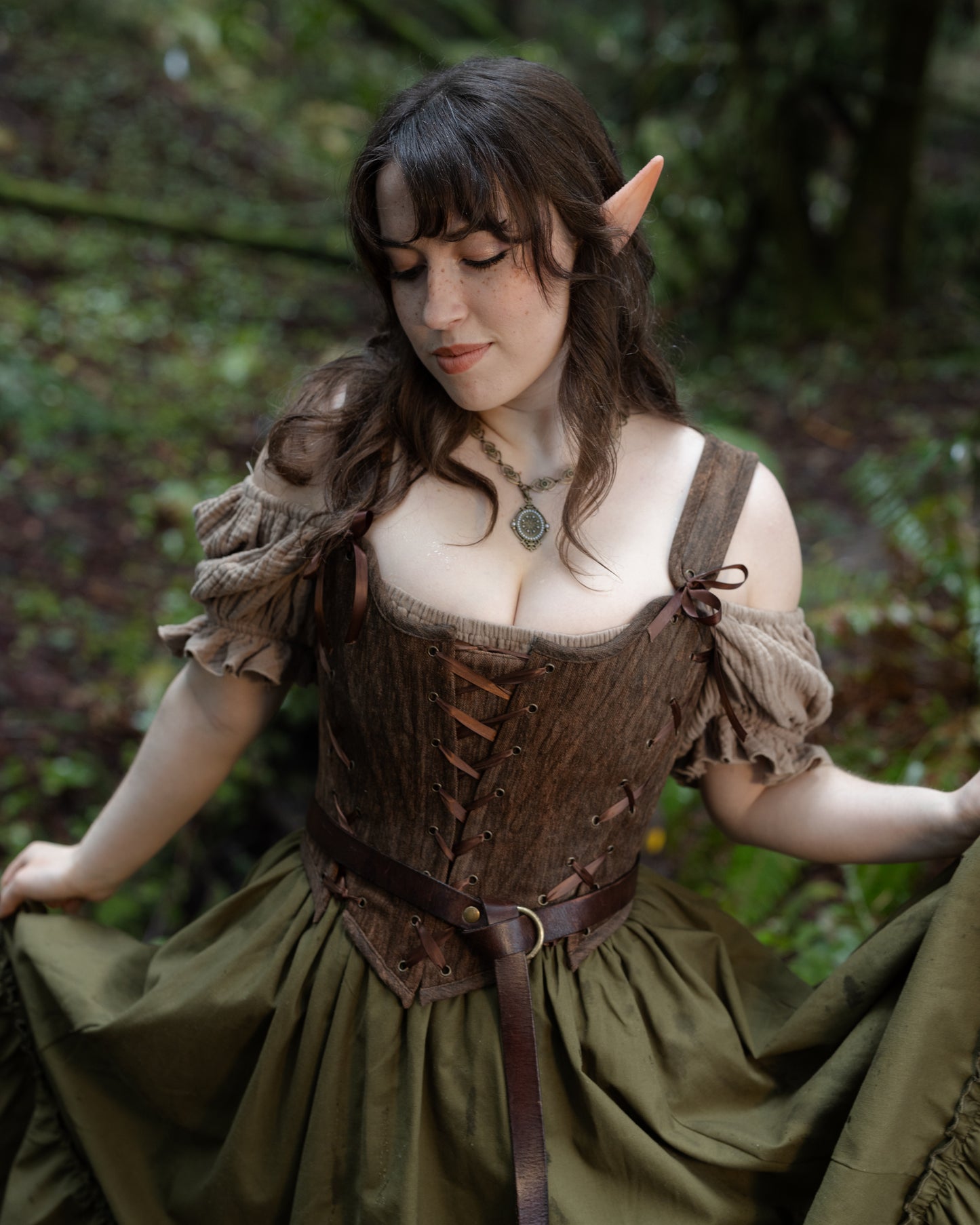Woman wearing Brown Princess Stays corset in forest setting, gallery position 4, portrait orientation, 4000x5000px