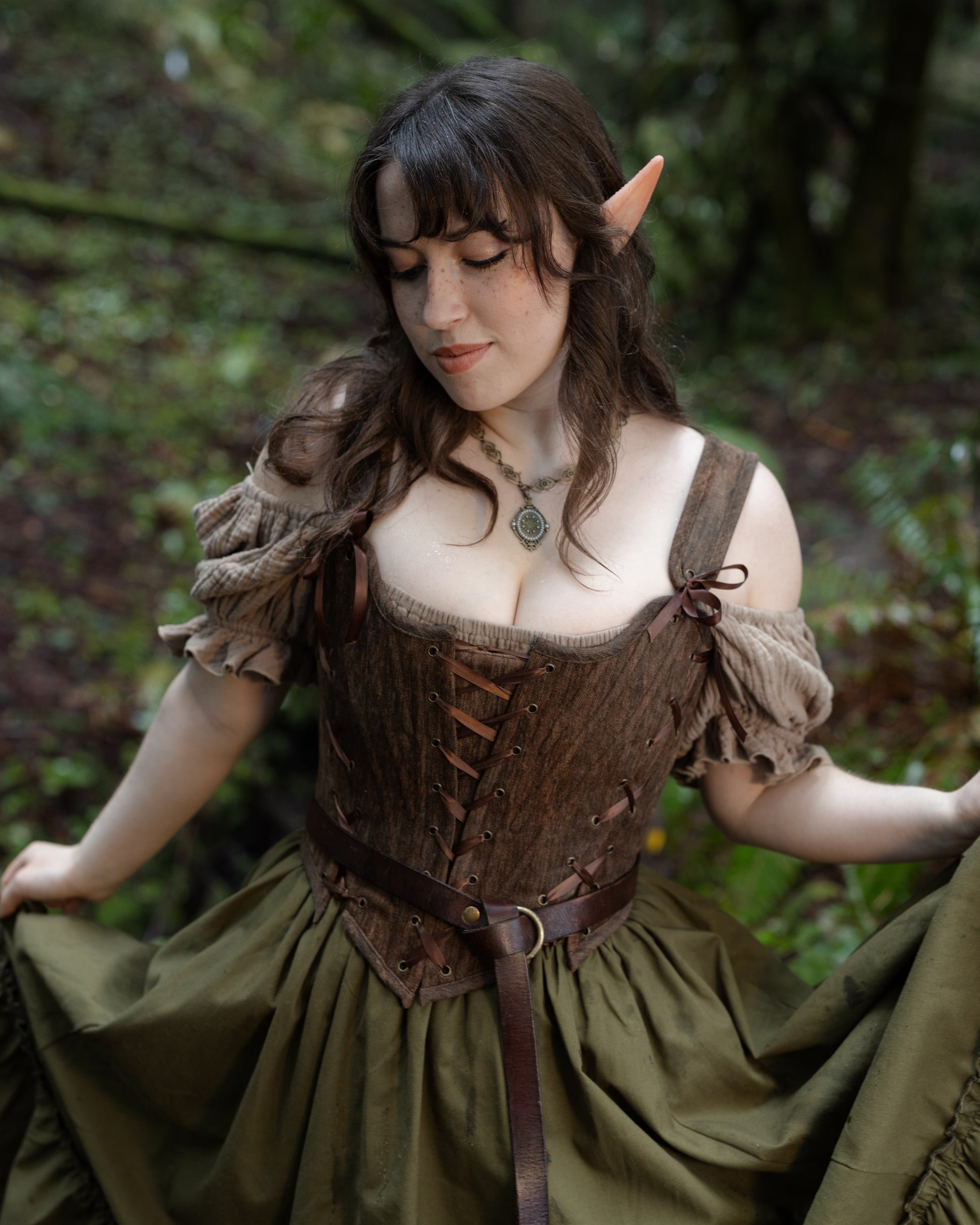 Woman wearing Brown Princess Stays corset in forest setting, gallery position 4, portrait orientation, 4000x5000px