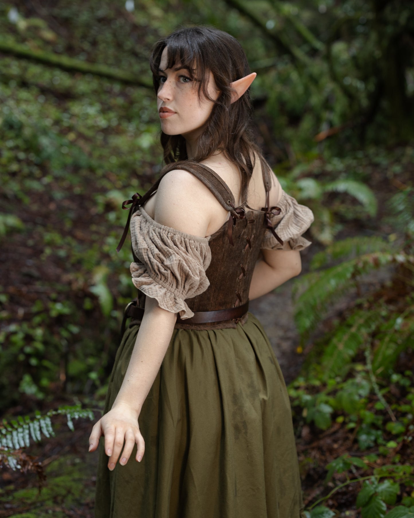 Brown Princess Stays corset worn by model in forest setting, gallery position 3, portrait orientation 4000x5000