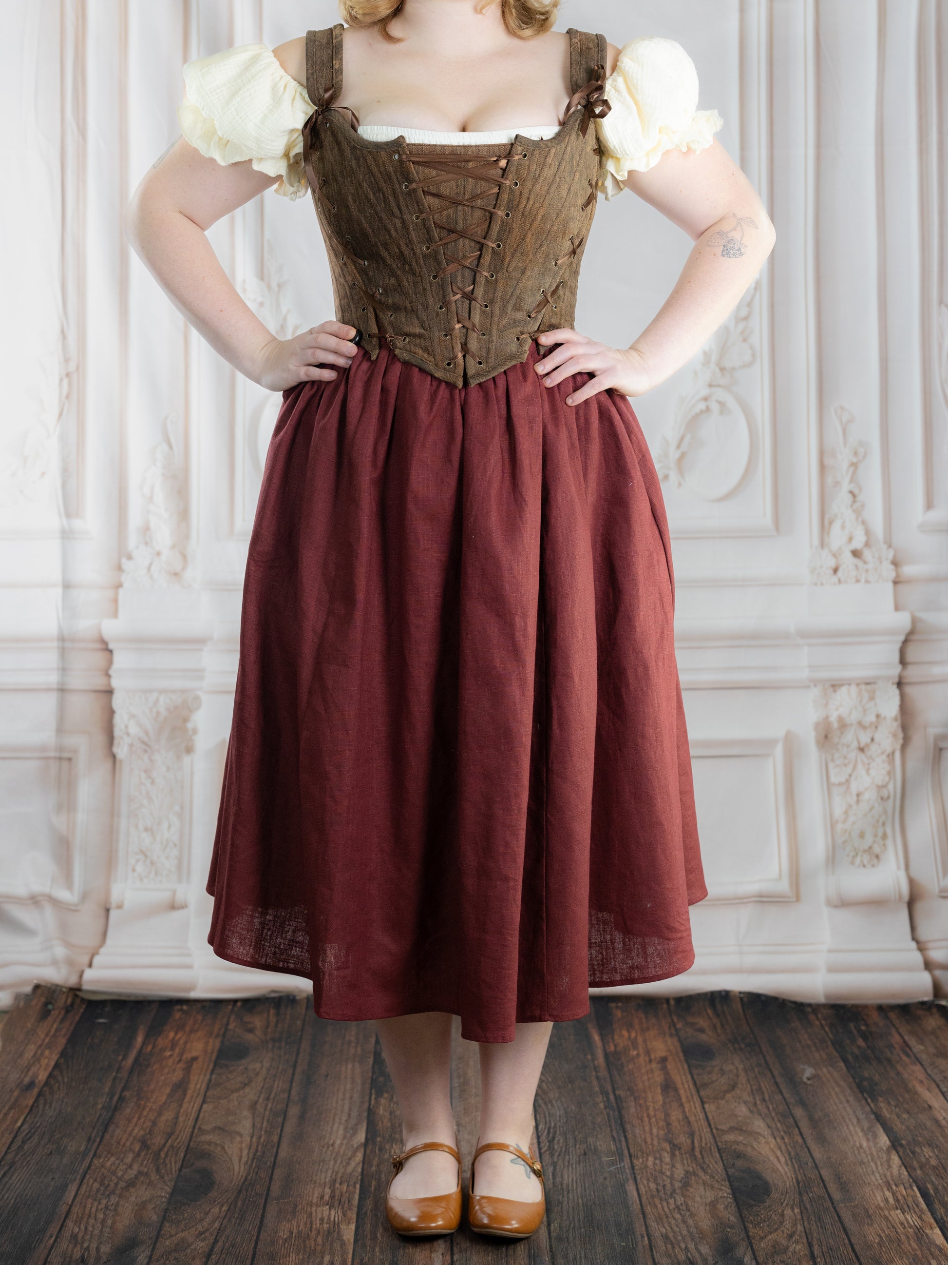 woman wearing brown corset and maroon skirt standing with hands on hips Brown Princess Stays corset