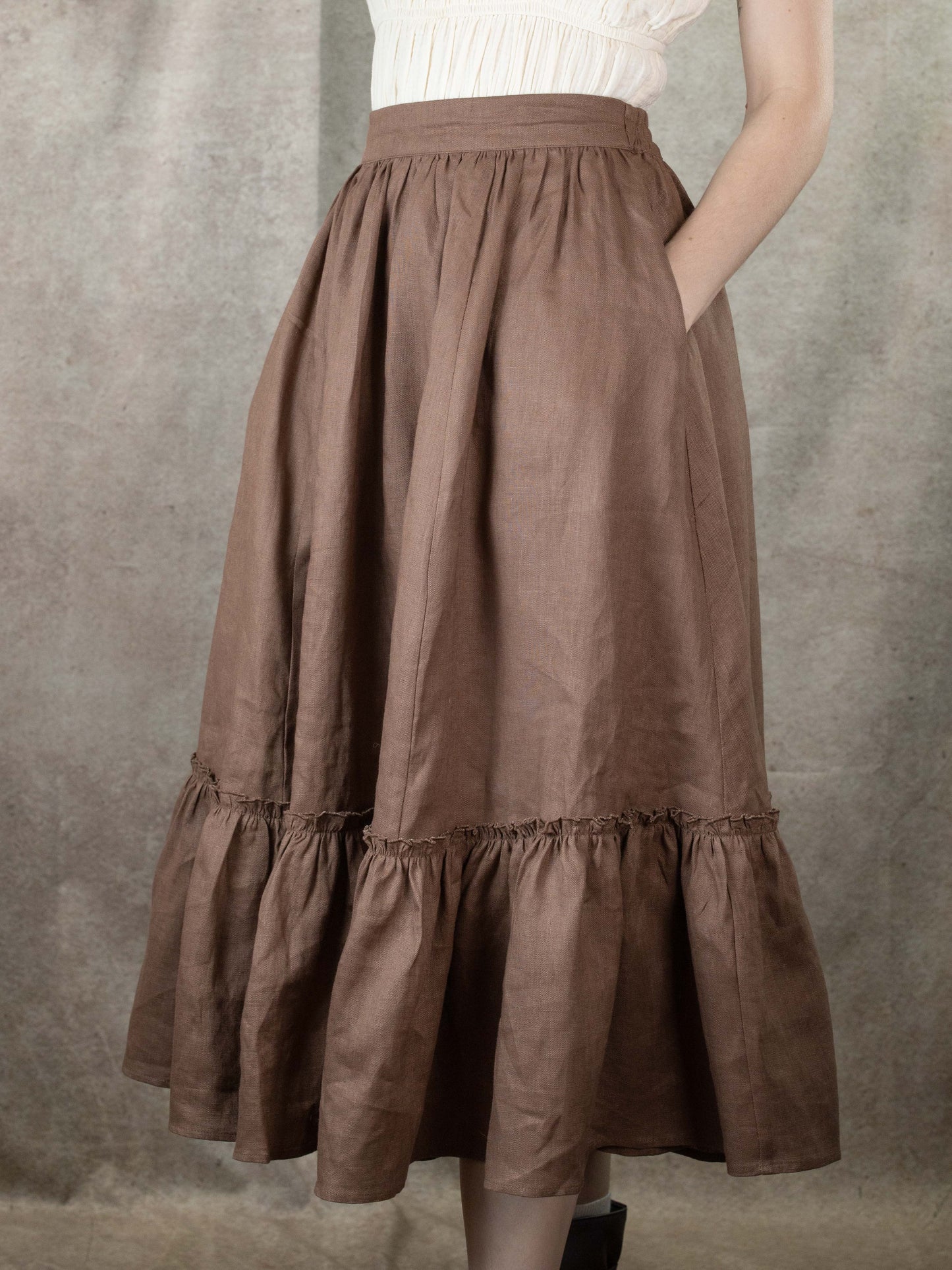 model showing pockets in linen renaissance skirt