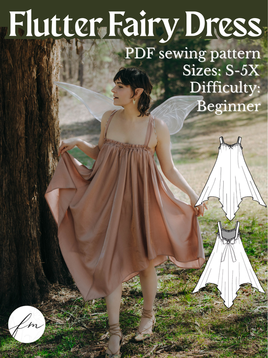 Woman wearing a flowing dress outdoors with fairy wings showcasing the Flutter Dress PDF Sewing Pattern design and style.