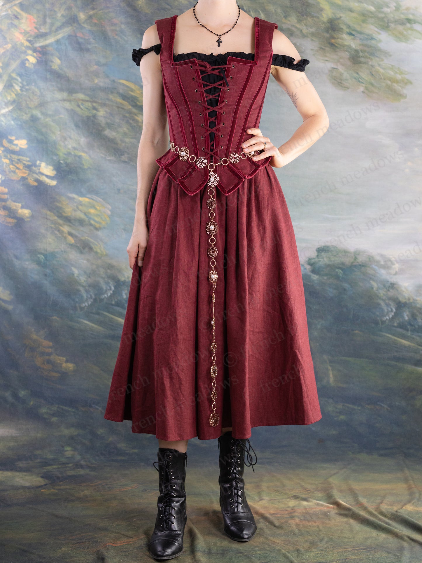 Rosette Medieval Chain Belt worn over a burgundy medieval-style dress with filigree rosette medallions and long chain detail