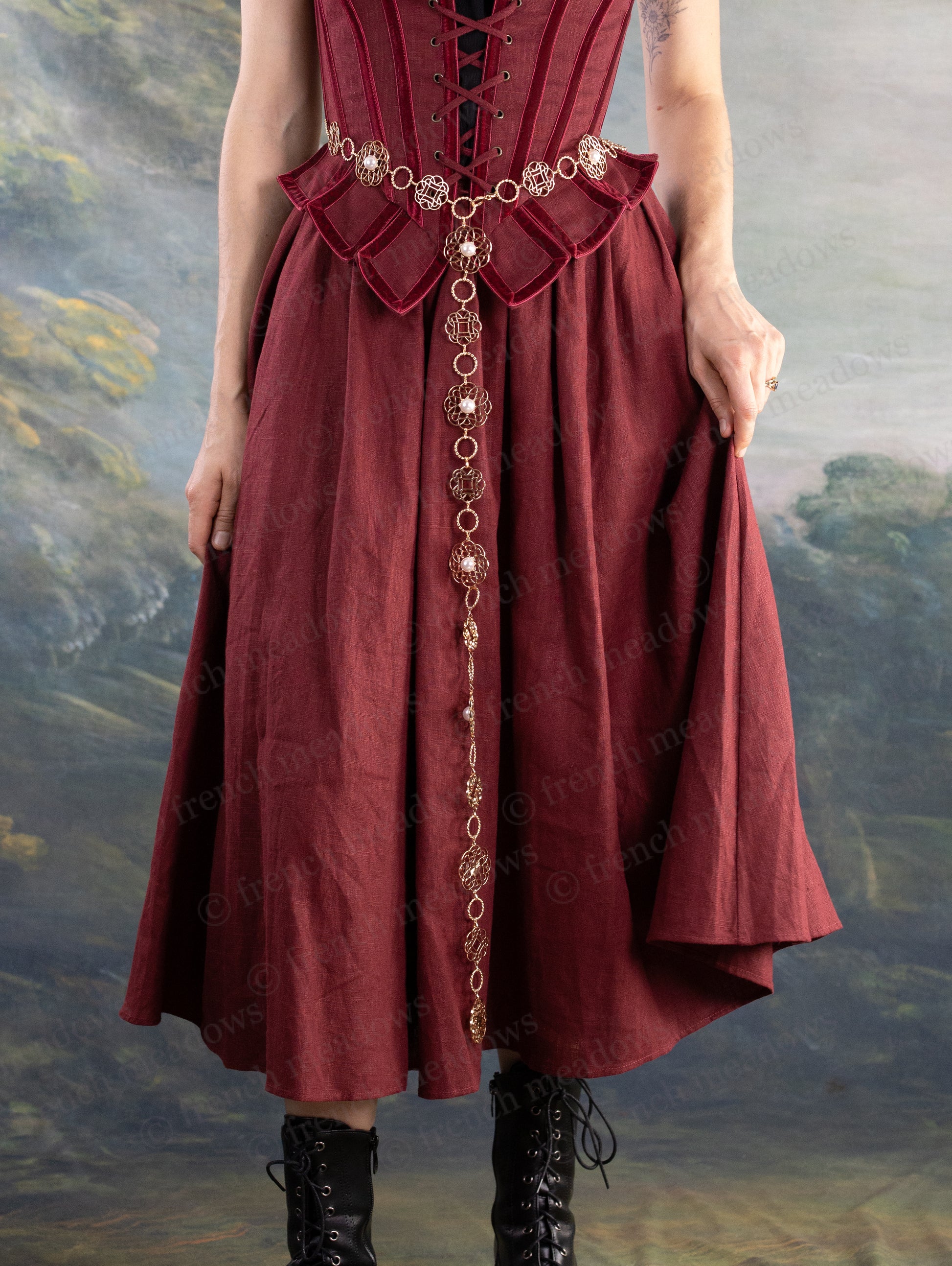 Rosette Medieval Chain Belt with intricate filigree rosette medallions worn over a burgundy medieval-style dress