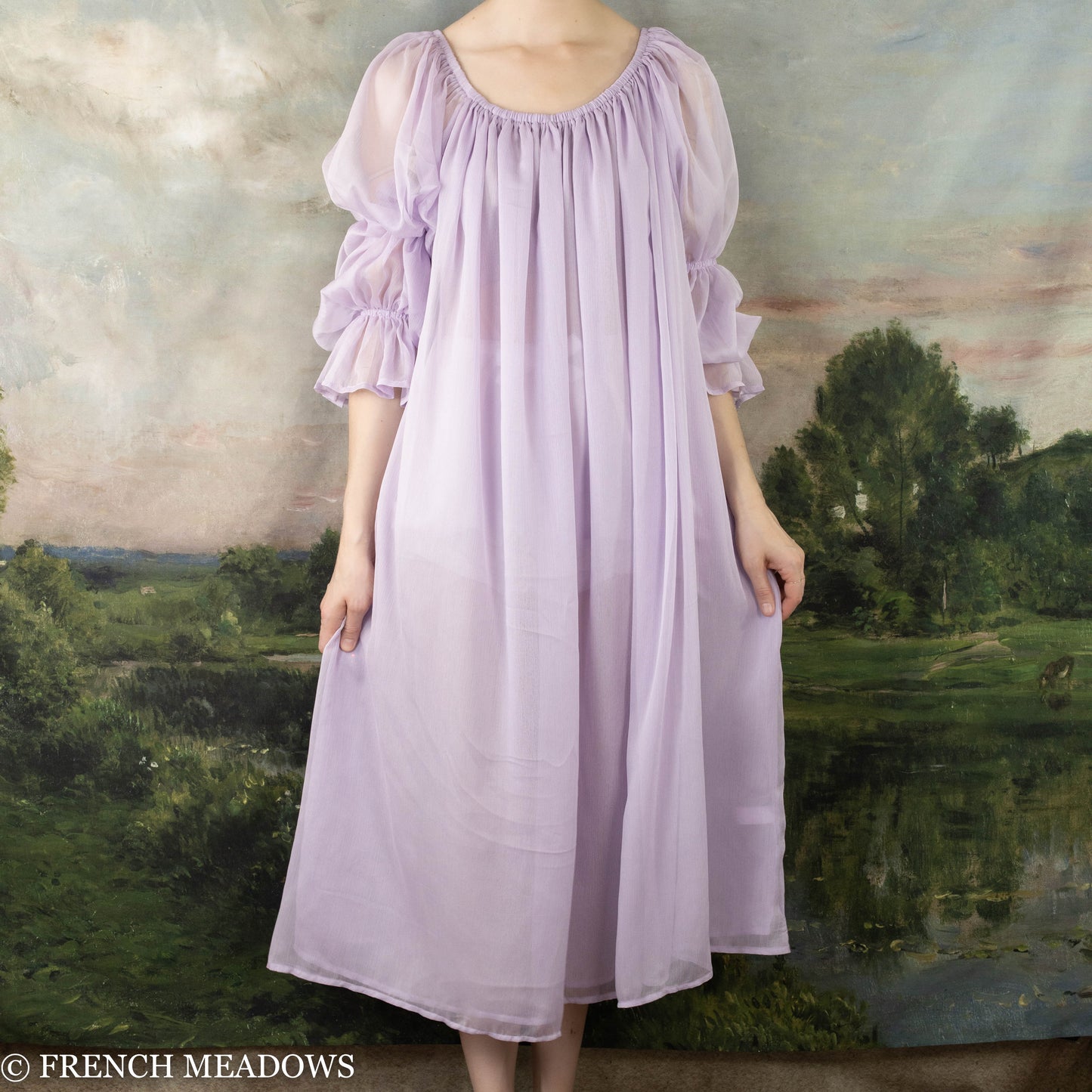 model wearing lilac sheer dress as a nightgown