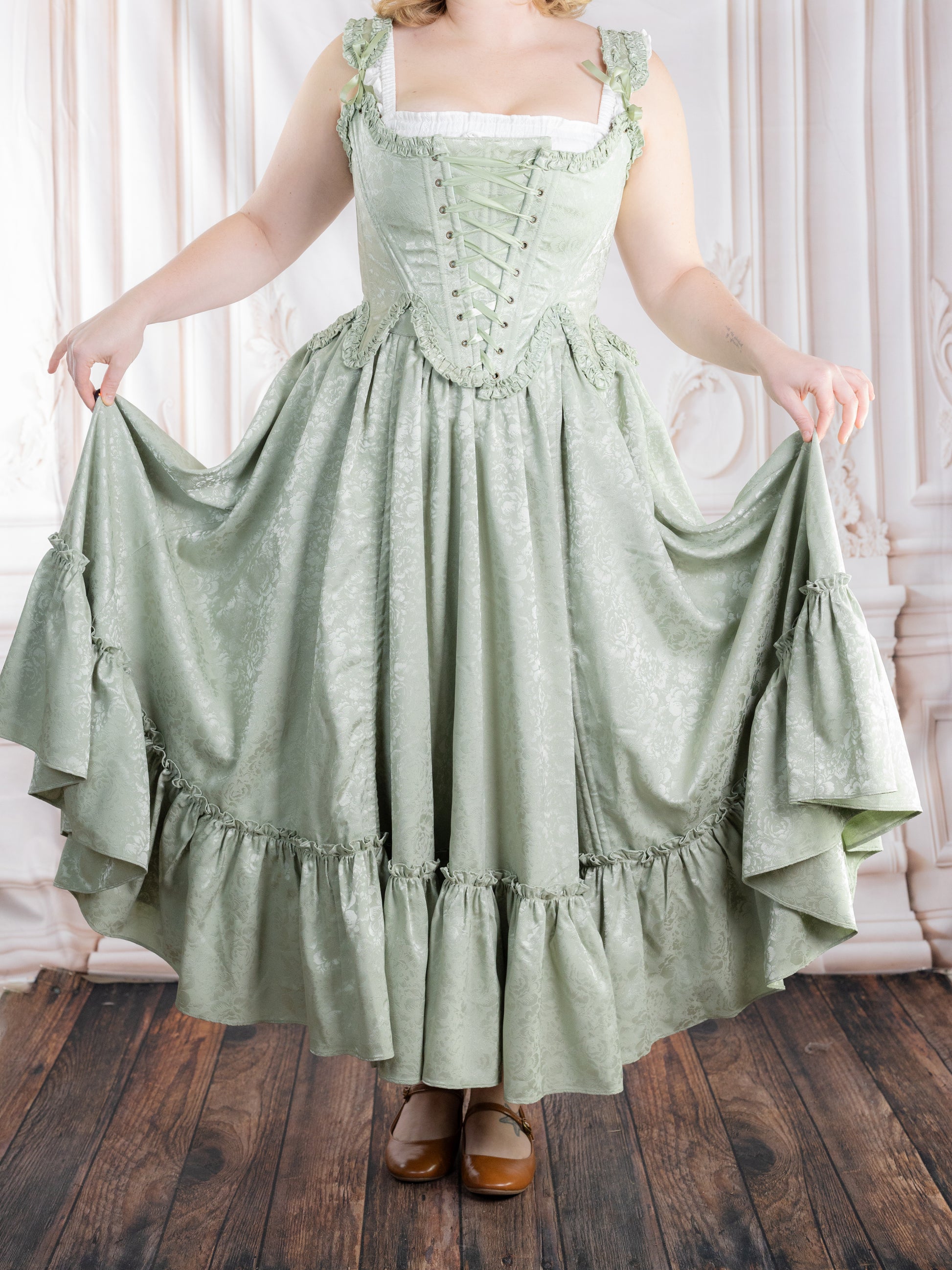 Mint Floral Ruffle Skirt in pale green with subtle floral pattern, soft fabric, and vintage-inspired ruffles and volume.