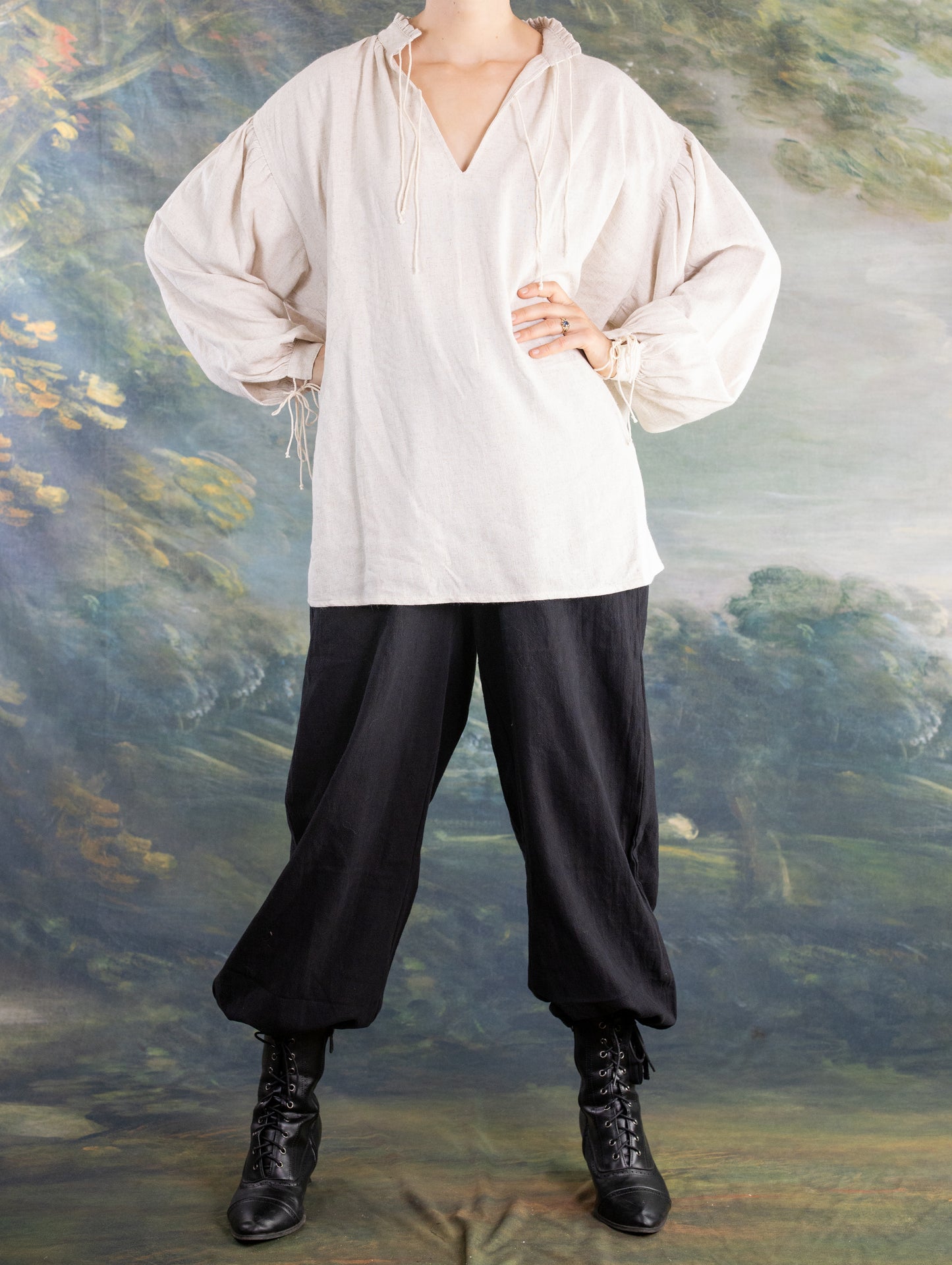 Borgia Shirt styled with loose black pants and lace-up boots against a painterly natural backdrop