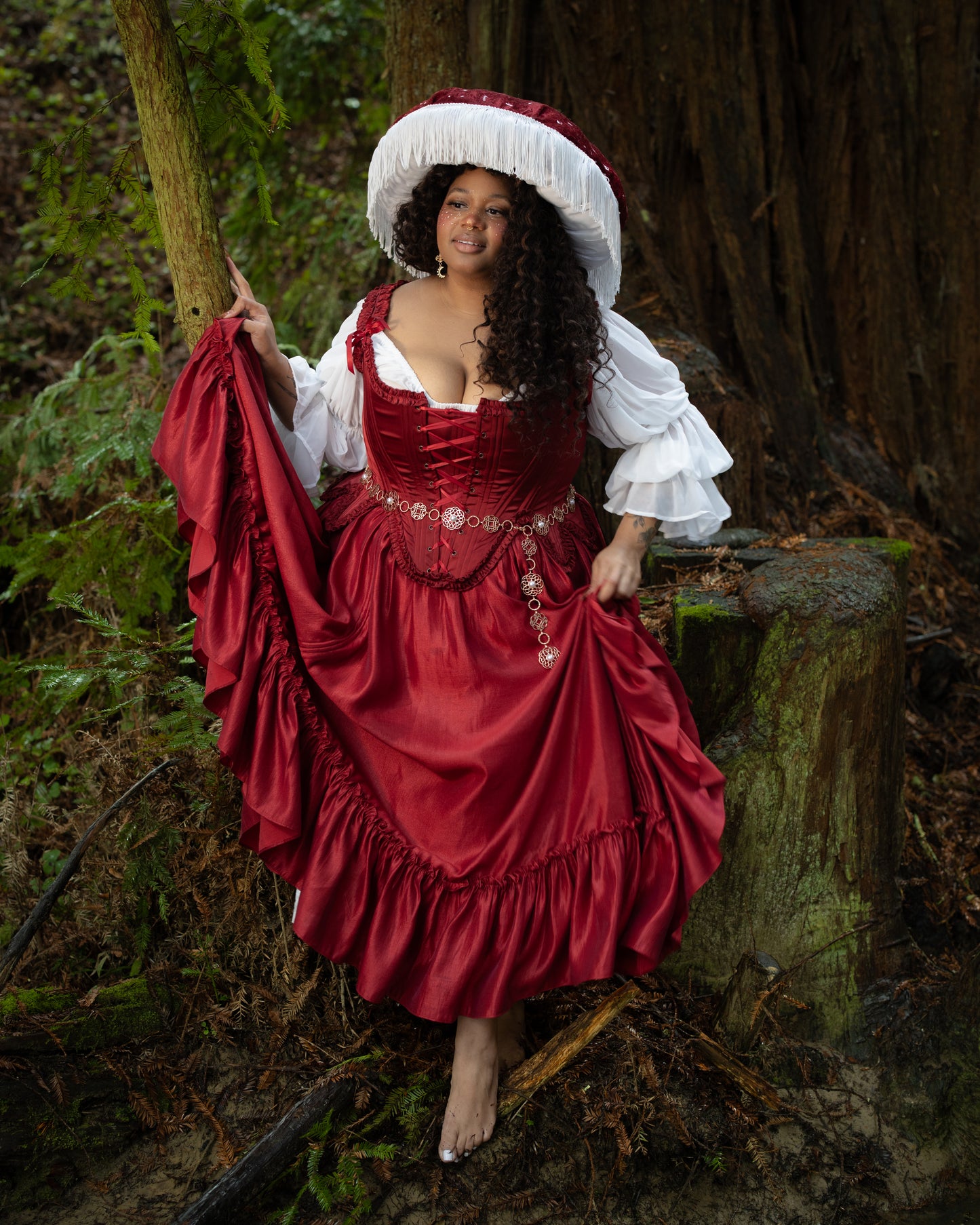 Red Satin 18th Century Stays worn with ruffled skirt and wide-brimmed hat in portrait gallery position seven.