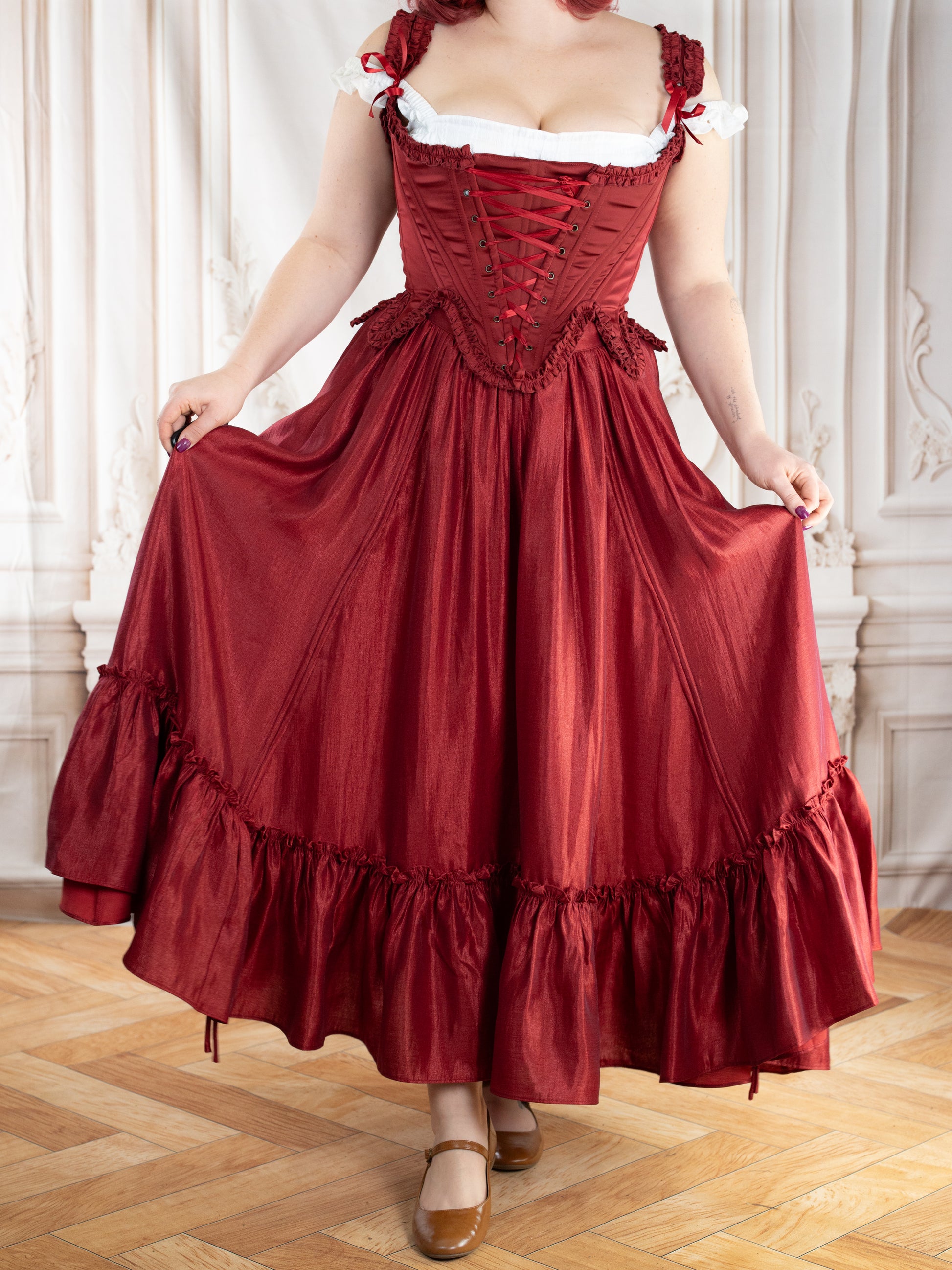 Red Satin 18th Century Stays with ruffle trims and corset lacing, styled in an elegant rococo silhouette.