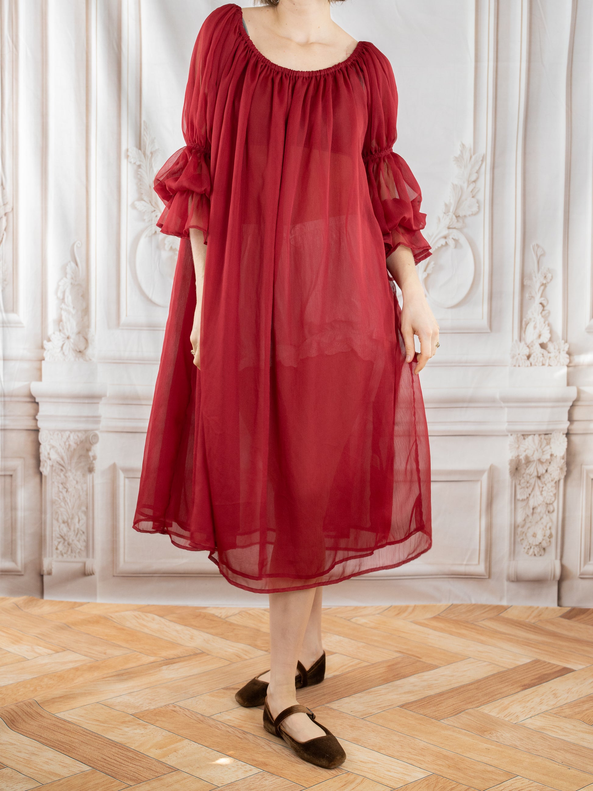 Red Chiffon Chemise featuring sheer, flowing fabric with gathered neckline and voluminous sleeves in a luxurious red shade