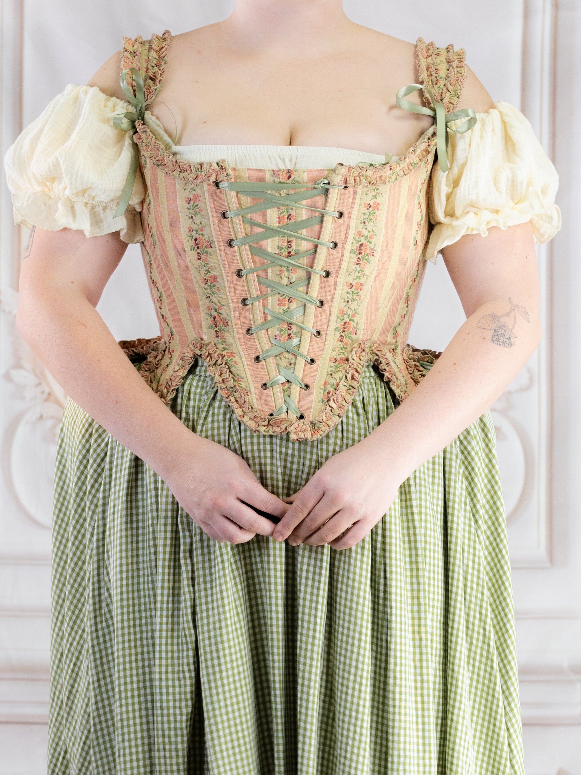 Rococo Pink 18th Century Stays with pastel stripes and laced front, styled with puffed sleeves and gingham skirt