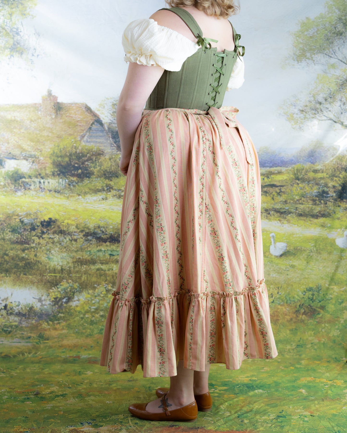 Rococo Pink Ruffle Skirt with floral stripes and drawstring detail worn with a vintage style bodice and puff sleeves