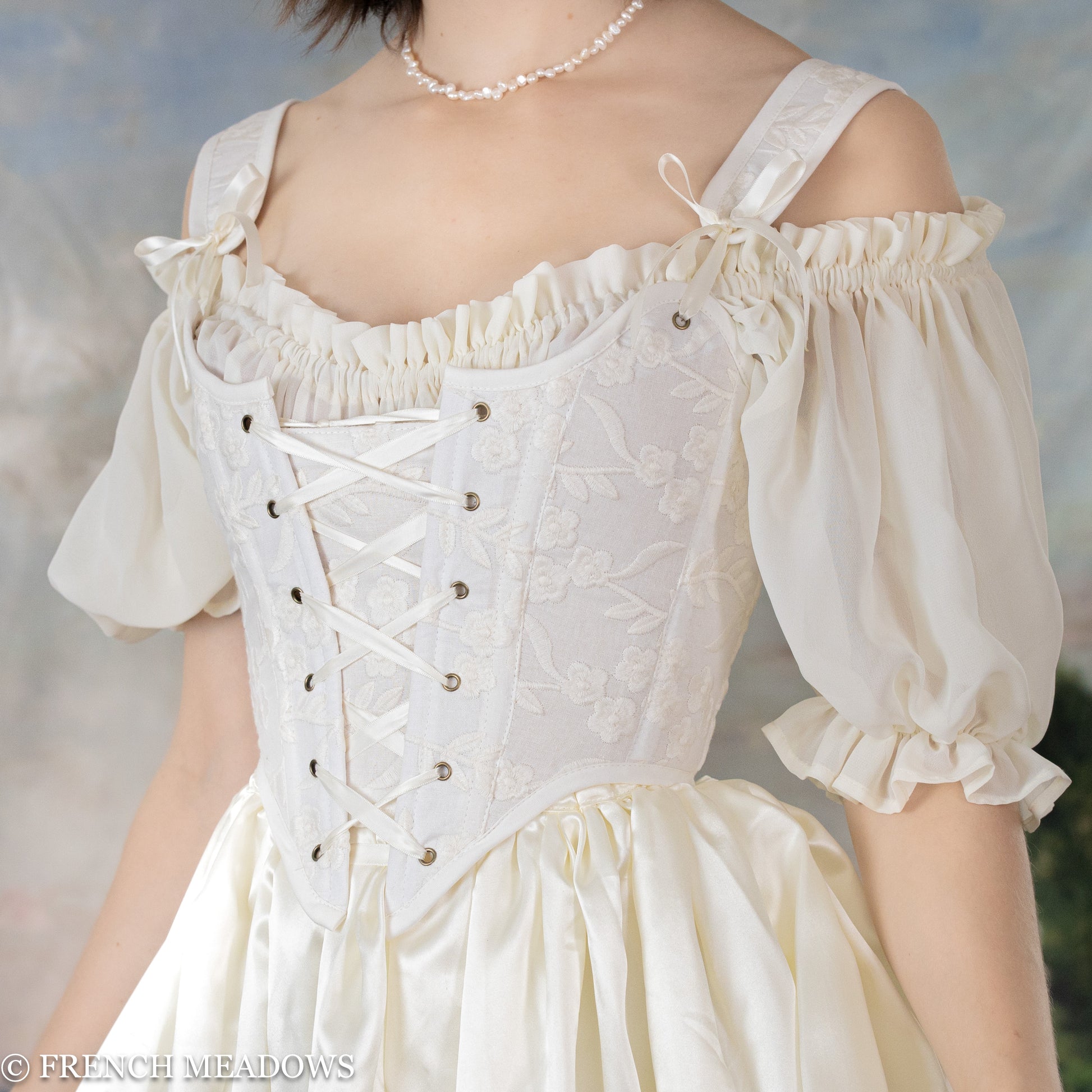 close up view of model wearing a renaissance corset for a medieval wedding dress